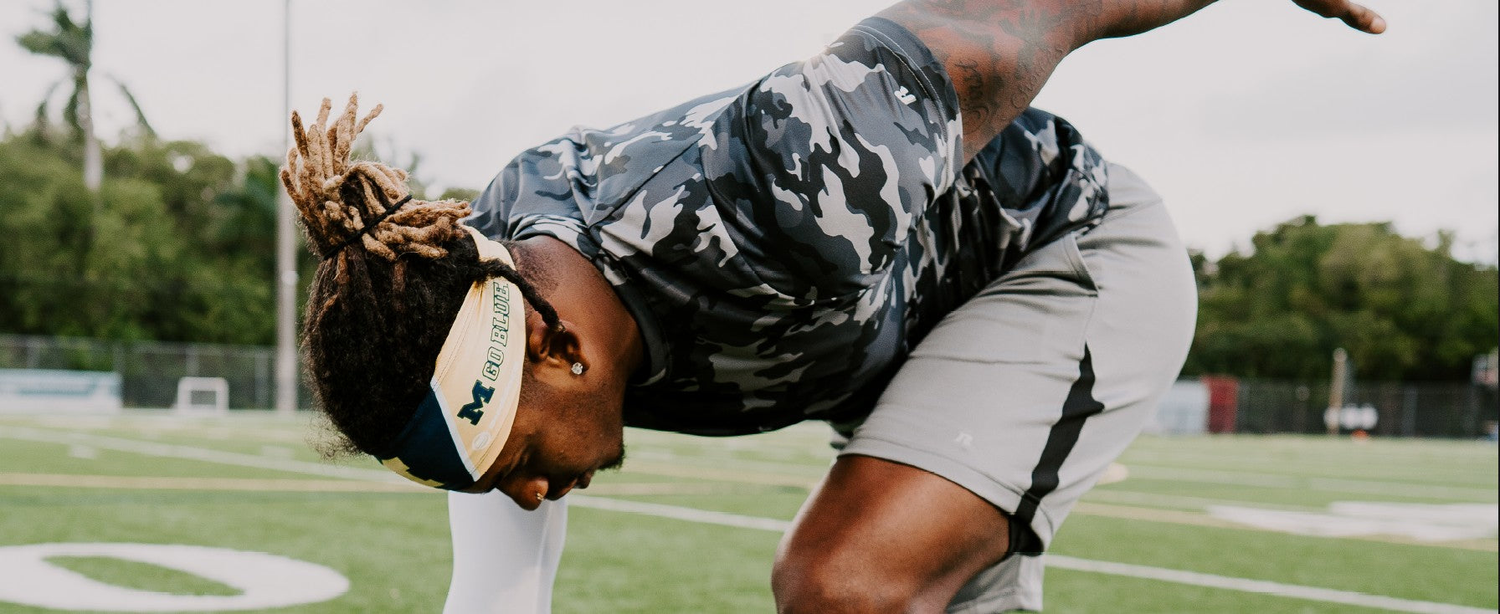 Fan wearing Suddora Florida State University headbands and wristbands