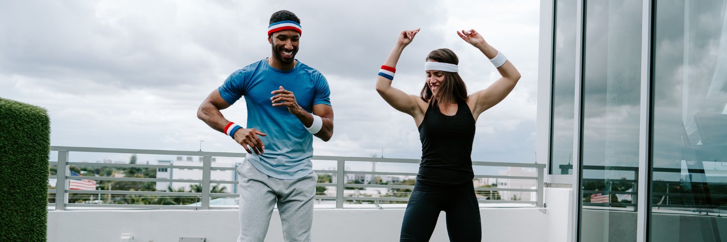 Couple wearing head sweatbands and cotton wristbands