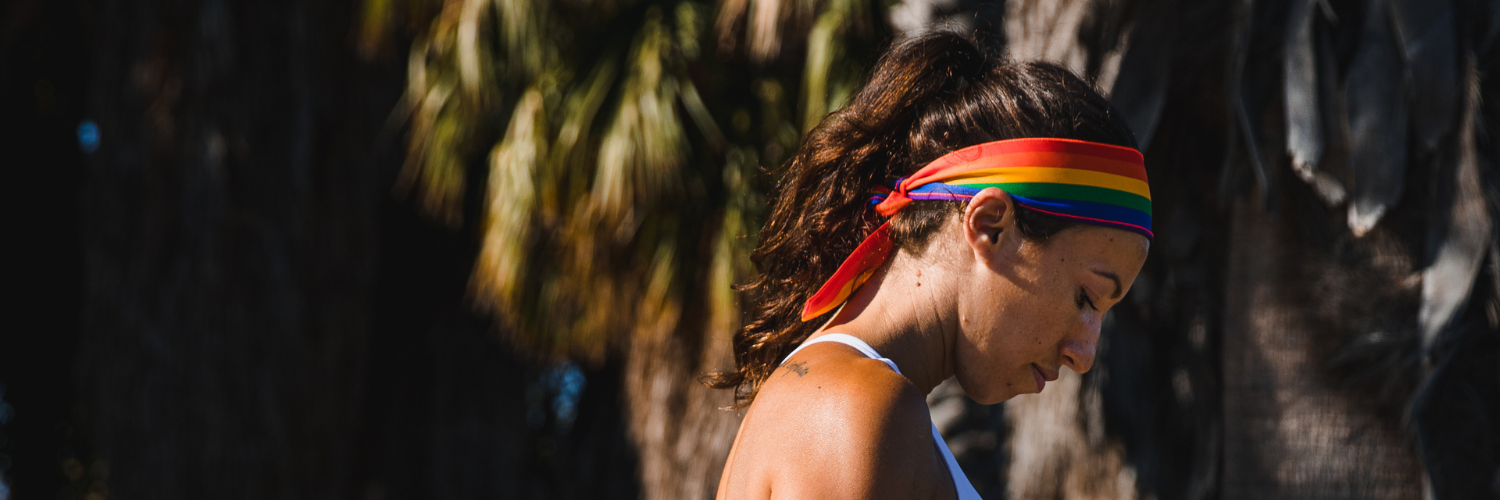 Woman wearing Suddora Rainbow tie headband