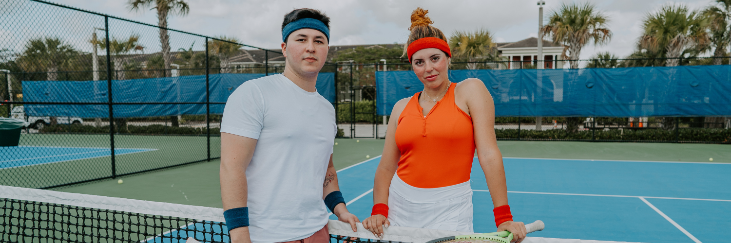 Tennis players wearing Sweatband Sets