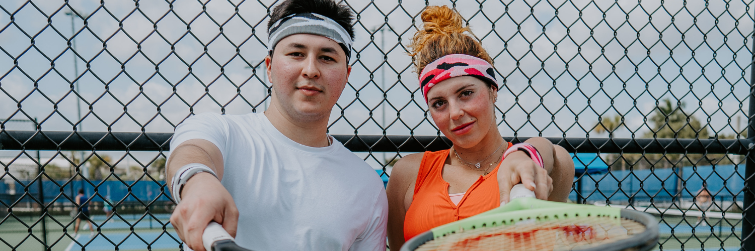 Tennis players wearing Suddora terry cloth headbands and wristbands