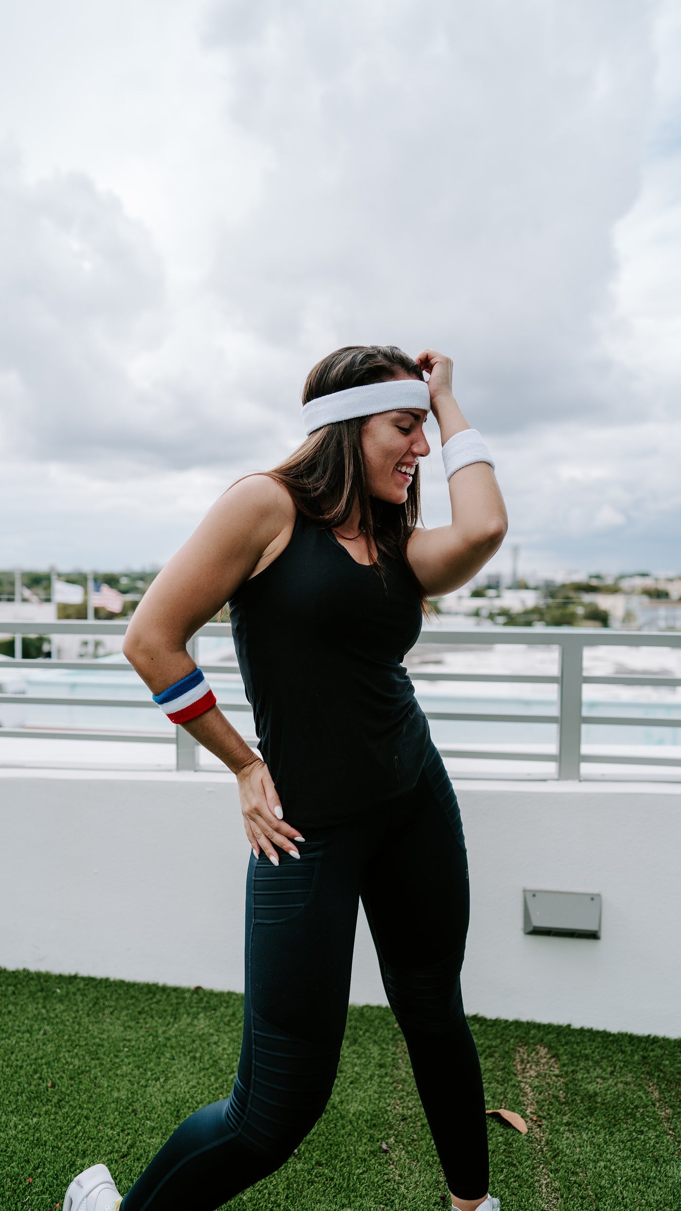 Women dancing with terry cloth headband and wristbands