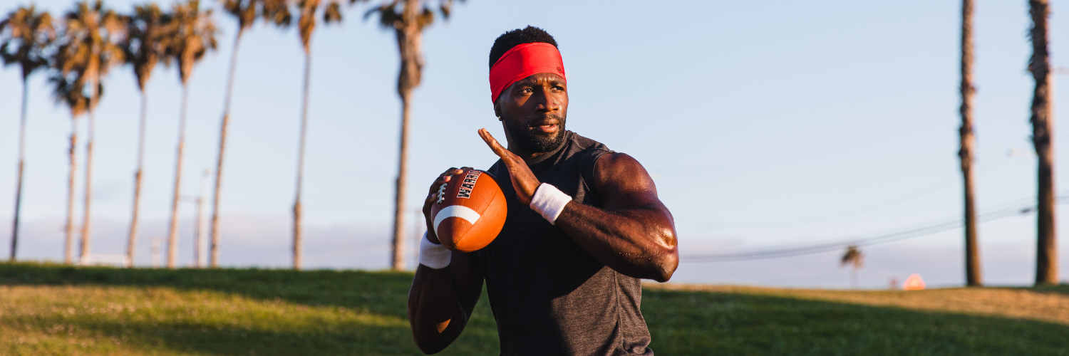 football player wearing Suddora plain headband and wrist sweatbands